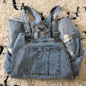 ripped jean overalls